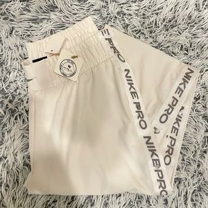 Nike Pro off white track pants with buttons